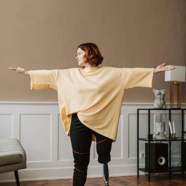 Person in a simple, accessible yoga pose suitable for beginners.